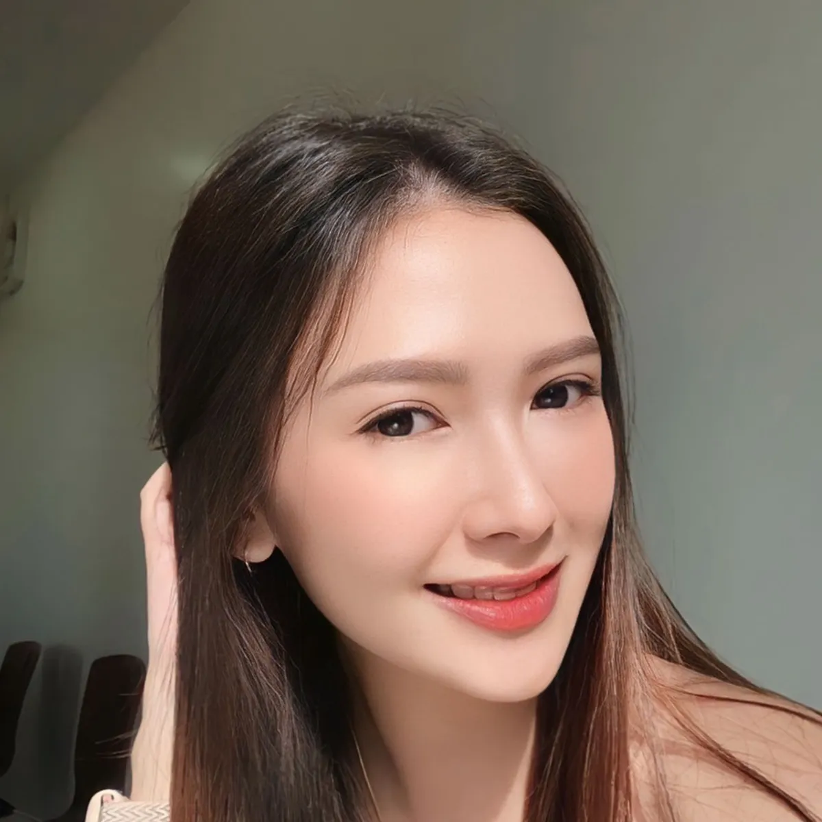 ภาพบุคคลคนไข้หญิงกำลังยิ้ม